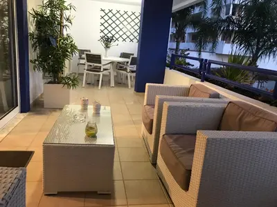 a bathroom with a shower and a toilet and a sink at Timeless Vacations Vilamoura Marina Flat WIFI & Pool in Vilamoura
