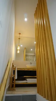 a bathroom with a tub and a sink and a shower at Golden Cliff House in Albufeira