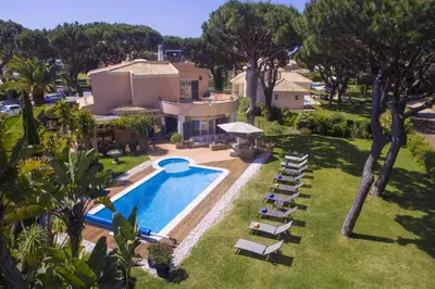 an aerial view of a house with a swimming pool at Rubi in Vilamoura