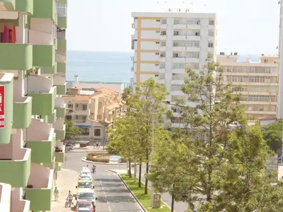 an aerial view of a city street with buildings at Alsol in Quarteira