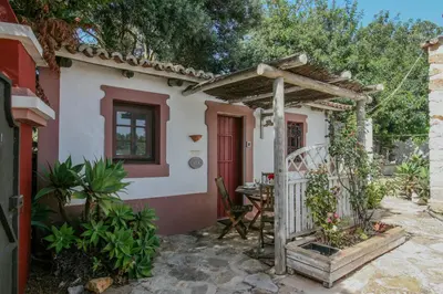 a swimming pool in a yard with a house at FLH Belaventura Villa in Boliqueime