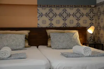 a bedroom with a bed and a window at RIA Terrace in Faro