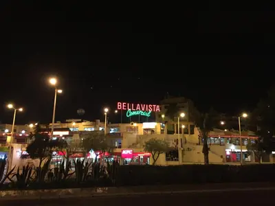 a lit up sign for a restaurant at night at Bellavista Ténis Clube - Studio Sea View in Albufeira