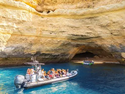a group of people on a raft in a cave at Villa Florença by Algarve Vacation in Albufeira