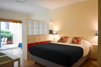 a bedroom with a large bed in a room at Old Village Prestige 101 in Vilamoura