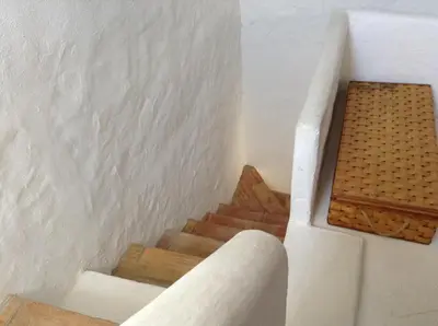 a view of a staircase in a house at Casa da Esperança – Rural and beach Villa in Algarve in Boliqueime