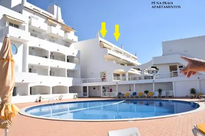 a view of the swimming pool of the hotel at Pé na Praia in Albufeira