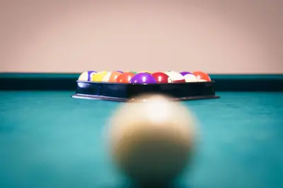 a cue ball in front of a pool table at Mercedes Country House in Faro