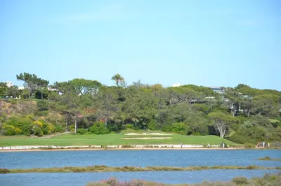 a view of the green at the golf course at Quinta do lago & golf in Quinta do Lago