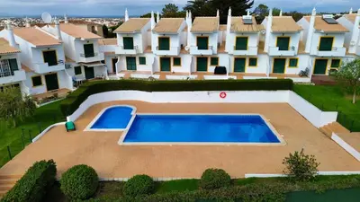 an aerial view of a large house with a swimming pool at Casa Galé - Joia das Sesmarias 600mts praia in Albufeira