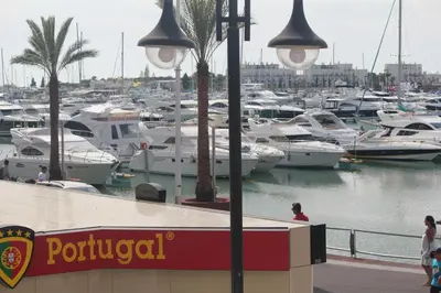a group of boats docked in a marina at Victoria Studio in Vilamoura