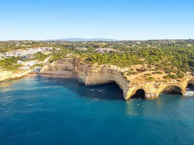 an aerial view of a beach with an arch in the water at Villa Maldives by Algarve Vacation in Montes Borralhos