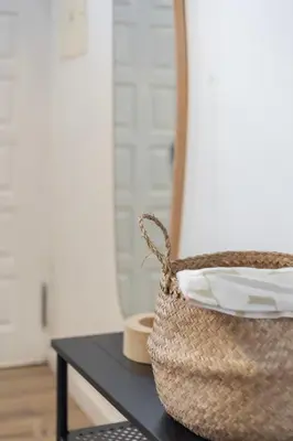 a basket sitting on a table in a room at The Central Townhouse in Faro