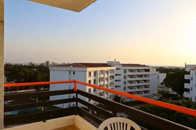 a balcony with a view of a building at Marbel Sol - Clever Details in Vilamoura