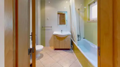 a bathroom with a sink and a toilet and a tub at Smy Santa Eulalia Algarve in Albufeira