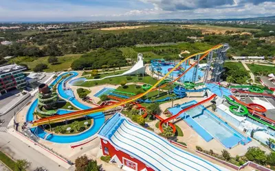 an aerial view of a water park with a roller coaster at Romantic Studio By Ethnic Ocean in Vilamoura