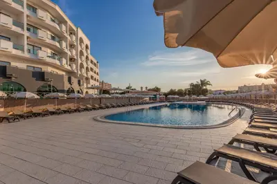 a large swimming pool in front of a building at The Navigator - Solaqua in Albufeira