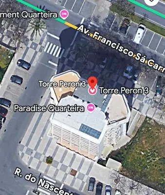 a map of a parking lot with a red spot at Paradise Quarteira in Quarteira