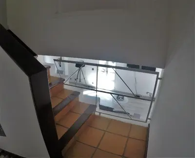 an overhead view of a staircase with a glass case at Vilamoura in Vilamoura