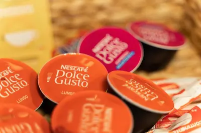 a close up of a pile of orange and red stickers at Apartamento Yacintos in Albufeira