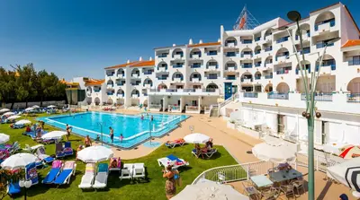 a view of a hotel with a swimming pool at Tropical Sol in Albufeira