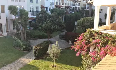 an image of a garden with flowers and plants at T3 Townhouse Old Village Vilamoura in Vilamoura