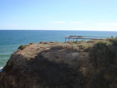 a view of the ocean from the edge of a cliff at Vila Algarvia Boutique & Suites in Albufeira