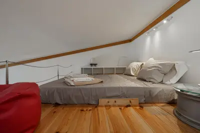 a bedroom with a large bed in a room at BmyGuest - Quinta do Lago Terrace Apartment I in Quinta do Lago