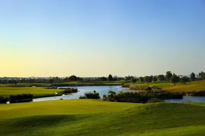 a view of a golf course with a river at VilamouraSun Aquamar 418 - Vista Marin in Vilamoura
