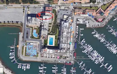 a map of a marina with a red circle at VilamouraSun Aquamar 418 - Vista Marin in Vilamoura
