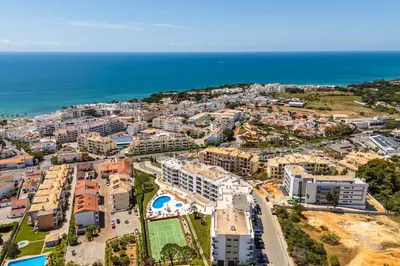 an aerial view of a city next to the ocean at Vista das Ondas by Algarneto in Albufeira
