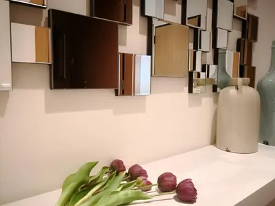 a counter with a vase and flowers on it at Algarve 