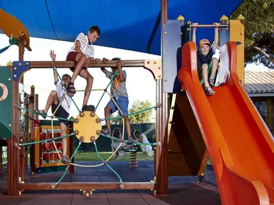 a group of people playing on a playground at Four Seasons Vilamoura in Vilamoura