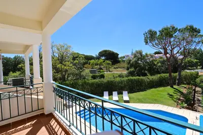 a view from the window of the garden at Villa Amendoeira 4 - Clever Details in Vilamoura