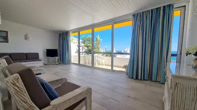 a living room with a view of the ocean at Albufeira, vista mar (63) in Albufeira