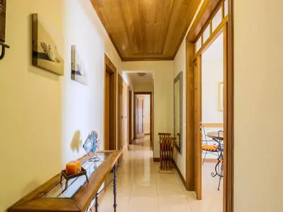 a hallway of a home with a wooden ceiling at Apartment Old Town Center Albufeira Walk to Beach in Albufeira