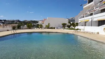 a large swimming pool in front of a building at Albufeira, Cerro Branco (42) in Albufeira