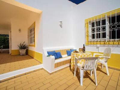 a living room with a table and a couch at Holiday Home Da Bela Vista by Interhome in Paderne