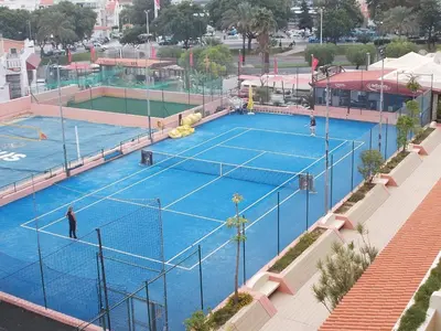 an overhead view of two tennis courts in a city at Bellavista Studio in Albufeira