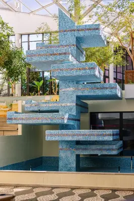 a staircase made out of blue tiles in a building at Muthu Oura Praia Hotel in Albufeira