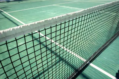 a tennis net on a tennis court at Muthu Oura Praia Hotel in Albufeira