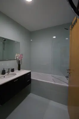 a bathroom with a tub and a sink and a bath tub at Monte da Eira in Albufeira