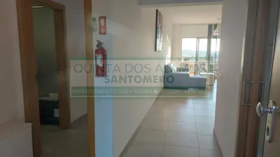 a door in a room with a sign on the wall at Apartamento Vitismar CA in Guia