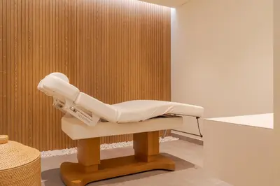 a hospital examination room with a white examination chair at Hapimag Resort Albufeira in Albufeira
