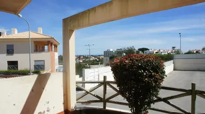 a plant sitting on top of a roof at Pool & Garden Oura Albufeira Flat in Albufeira