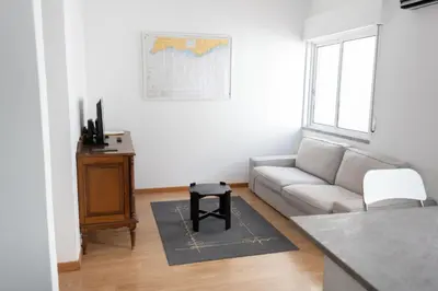 a living room with a couch and a table at Casa Gago in Faro