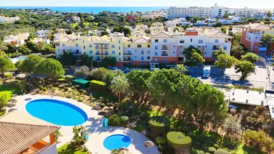 an aerial view of a resort with a swimming pool at Fabulous Sunny Pool&Garden Condo by BeCherish in Albufeira