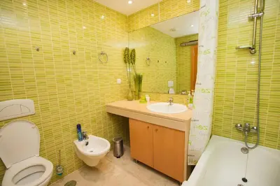a bathroom with a toilet and a sink and a shower at Fabulous Sunny Pool&Garden Condo by BeCherish in Albufeira