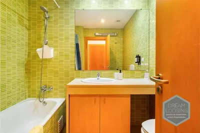 a bedroom with two beds and a window at Corcovada B42 - Dream Lodging in Albufeira