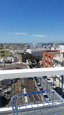 a view of a city from the top of a building at Residencial Condado in Faro